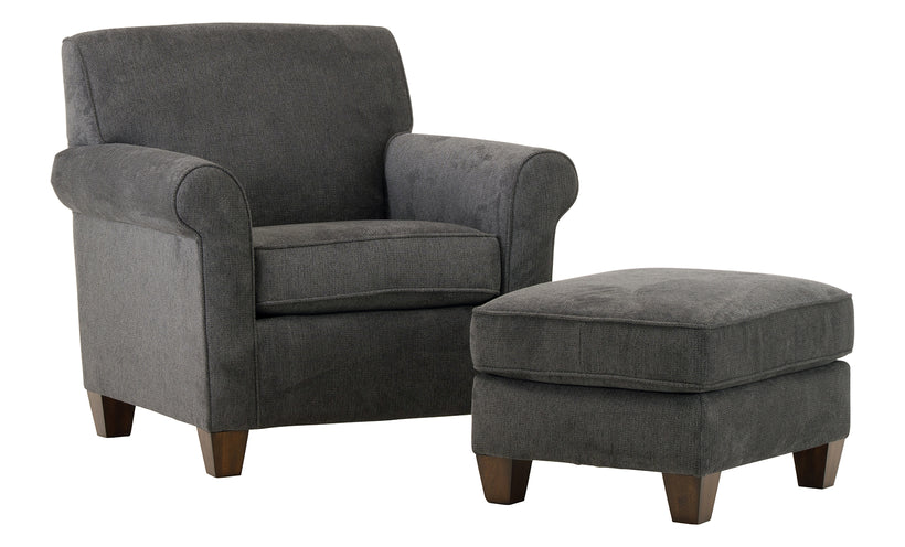 Gray armchair with matching ottoman on a white background